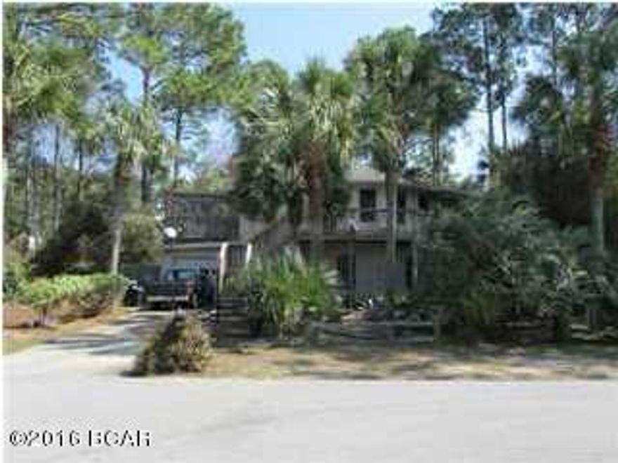 Location, Location...Beautiful 1800 sq foot Beach House, just minutes away from the beautiful white sands of Mexico Beach. This 2 bedroom plus den Octastructure home is located in one of Mexico Beaches well established locations and is 5 min walk to the beach. The entire lot has been landscaped with pathways and palm trees, complete withgazebo. This home boasts a huge outdoor deck plus an indoor screened in Lanai. The two bedrooms are on the upper main floor and there is a family room, Den, and another glassed in Lanai on the ground floor, The home has recently been completely painted on the outside and has a brand new High efficiency Heat pump and new water heater, Check this out, will not last long, For investors there is also a separate lot in the back of the fenced yard that has drivew