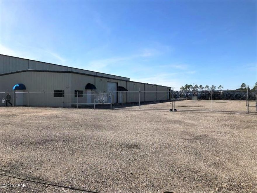 This Warehouse is located in the Bay Industrial Park on Hwy 231 in Bayou George area of Bay County, Florida. One acre of land fenced with16 ft. Candle lever Gate,  6' of chain linked fencing (80% cleared with crushed asphalt-approx. 20% is warehouse.) Warehouse is in very good condition. approximately 1,000 square feet heated & cooled offices, Break room / kitchen area, and 2 bathrooms, one in the office area, one in the warehouse. Mezzanine storage area over the offices accessible by heavy duty steel stair case.  14' eave height, with natural & electrical lighting, two 

12' x 12' roll up doors. 400 amp panel with 3 Phase Electric., Public Water and Public Sewer. The property taxes, insurance & rental tax will be added.