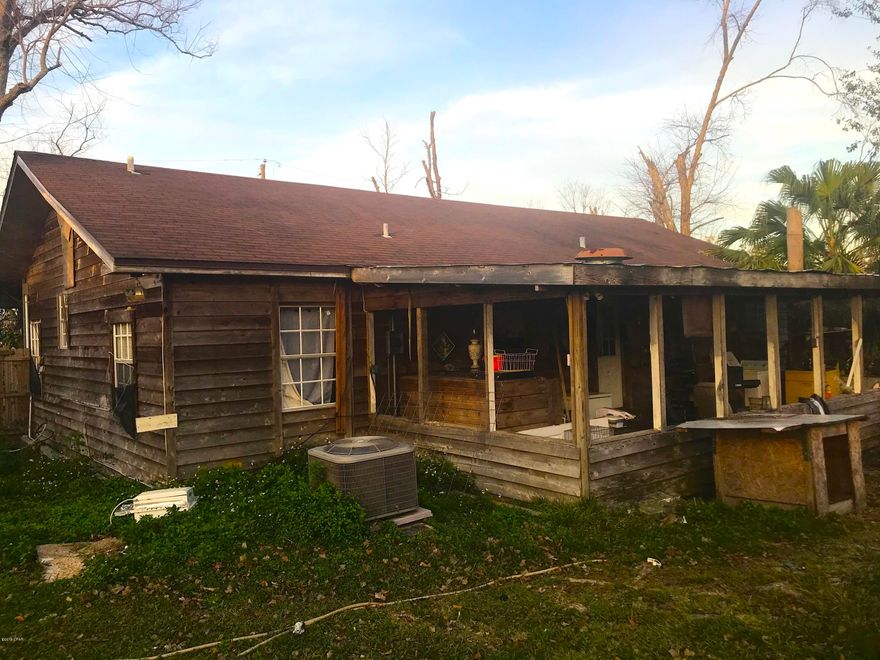 AMAZING fix & flip or investment opportunity here with this 4 Bedroom / 2.5 Bathroom home in Panama City! This home just needs some TLC in a big way - Siding needs to be refinished, interior needs some repairs, Etc. - But with a little work and not a lot of investment it could be great! It has awesome cedar siding, a full 1-car mechanic shop with sliding door, pole barn, and paved driveway and patio. The home also sits on almost a half-acre lot, so lots of room to move around and potential! The home is currently occupied with TENANTS for $1,000 / month, so it's also a great income-producing property! CONTACT CINDY FOR ALL SHOWINGS - DO NOT GO TO THE PROPERTY WITHOUT CONSENT. At this price, this home is a STEAL, and it WILL NOT LAST LONG!     ----- CASH BUYERS ONLY -----