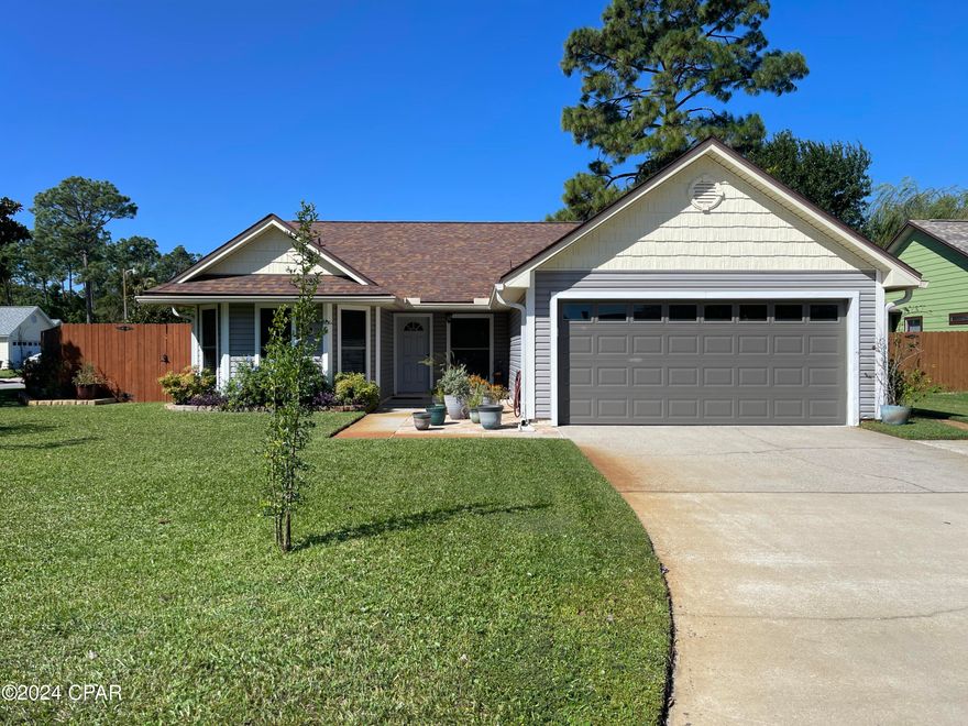 CURRENTLY UNDER CONTRACT, SELLER WILL CONSIDER BACKUP OFFERS

CLOSE TO THE GULF OF MEXICO!  Welcome to the coveted HERITAGE VILLAGE private community!  Conveniently located in the heart of Panama City Beach, close to PIER PARK MALL with plenty of family friendly entertainment venues, restaurants and shops!  Just a short 3-mile drive to the white sandy beaches, emerald-blue waters and warm breezes of the GULF of MEXICO!  

LUXURY LIVING:  This beautiful ranch home has been fully renovated with polished luxury vinyl plank (LVP) flooring throughout, modern lighting, impressive kitchen and bathroom upgrades, and features an incredible open floor plan design with an inviting living room with LP-gas fireplace, adjacent dining/office room, 3-bedrooms, 2-full bathrooms, 2-car garage with deep sink, and large enclosed climate-controlled Florida Room. 

FEATURES:  Large Master Bedroom has a custom-built decorative wall panel with accent lighting and plenty of closet space.  Modern barn-door slider access to the private ensuite Master Bathroom with dual vanity sinks, custom built-in wall shelving, incredible tile shower with glass sliding door and commode!  Both Guest Bedrooms have polished LVP floors with plenty of closet space with an improved Guest Bathroom between them.

IMPROVEMENTS:  
1.  Amazing backyard Florida Room addition (2010):  Provides plenty of natural lighting with heating and air ventilation, making this a great venue to host fun events for family and friends 24/7/365 days a year!  Beautiful Brick Pavers wrap around from the side entrance to the Florida Room back porch!
2.  Kitchen and Bathroom upgrades (2019):  Custom floor to ceiling hardwood cabinets, granite countertops, peninsula social gathering breakfast/coffee bar, stainless steel appliances and modern lighting. 
3.  Mechanical upgrades:  New 30-year Architectural Roof (2019), Exterior Vinyl Siding (2019), HVAC System (2020), Water Heater (2016), Garage Door with Electric Opener (2020), Private Backyard Boat/Vehicle Decorative Brick Driveway (2010), Backyard Perimeter Stained Fencing (2019), Private Backyard Shower, Well with Electric Pump for Lawn Sprinkler System [lawn is well-kept and beautifully manicured]
 
LOCATION:  Home is conveniently situated on a corner lot directly across from the community park and pond offering a peaceful serenity to escape while watching the tropical wildlife and Florida sunshine!  Look no further, you have found a rare luxury gem located in the heart of paradise Panama City Beach for under $400k!  Life is good, but even better in PC Beach!  Call me quickly to schedule an appointment as this home will not last long!