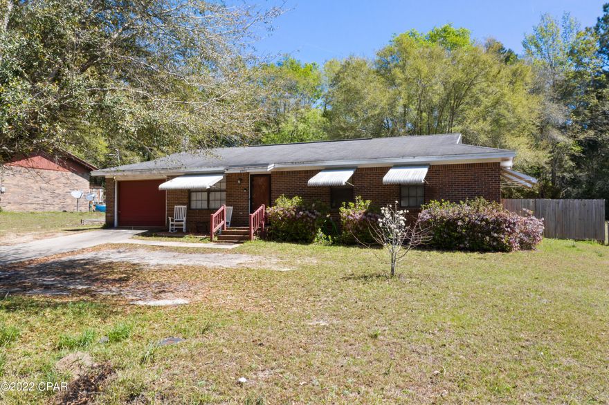 Come put your personal touches to this 3 bedroom, 2 bath brick beauty for you and your family to enjoy for years to come! Inside features include living room open to the dining/kitchen combo, spacious family room, master bedroom with en suite bath and a 23x11.5 bonus room with laundry. Outside you will find an attached carport, privacy fenced backyard, covered rear porch and 2 storage sheds. Home is conveniently located minutes from Hwy 79 and Interstate 10.