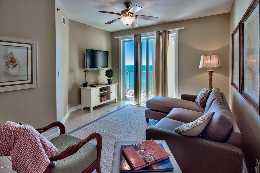 An exquisite 2BR/2BA Gulf front condo with bunk beds will sleep eight comfortably. The Gulf view master bedroom shares a spacious balcony that is also accessible from the living room. The master bath features dual vanities, a tub and separate shower, all beautifully tiled. This unit comes fully furnished and rental ready. The gourmet kitchen with breakfast bar features granite countertops and stainless appliances. With 650 feet of beach on the Gulf of Mexico, you can beach it or enjoy one of the many Grand Panama pools, including the

beachfront pool, kiddie pool, roof top terrace pool, or two spa pools. The Tiki Bar will keep you refreshed on a hot summer day or after a tough workout at the state-of-the-art

fitness center.