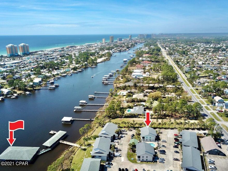 BOAT, FISH & BEACH LOVERS! This GEM Opportunity to OWN a Ground Floor, Upgraded Unit, that COMES with a Deeded, Covered BOAT SLIP & LIFT in the Deepest part of the Lagoon (2nd to last End Slip) WILL GO FAST! Open & Spacious 2BR/2BA Condo offers a Lagoon Water View from the back Enclosed Sunroom that has a 2nd Door Entrance/Exit, just steps away from the Pool or Boat Dock! Upgrades include LVP Flooring (ZERO CARPET), Granite Countertops & Custom Tiled Backsplash in the Kitchen! The Luxurious Master Bath literally takes your breath away, beautifully upgraded with Coastal Modern-Beachy Chic colors, Quartz Countertop, Custom Tiled Wall & Cabinets! LIVE or VACATION in this Gorgeous Unit w/a BOAT SLIP, convenient to everything by Boat or few minute Drive from ALL you will NEED, LOVE & ENJOY!