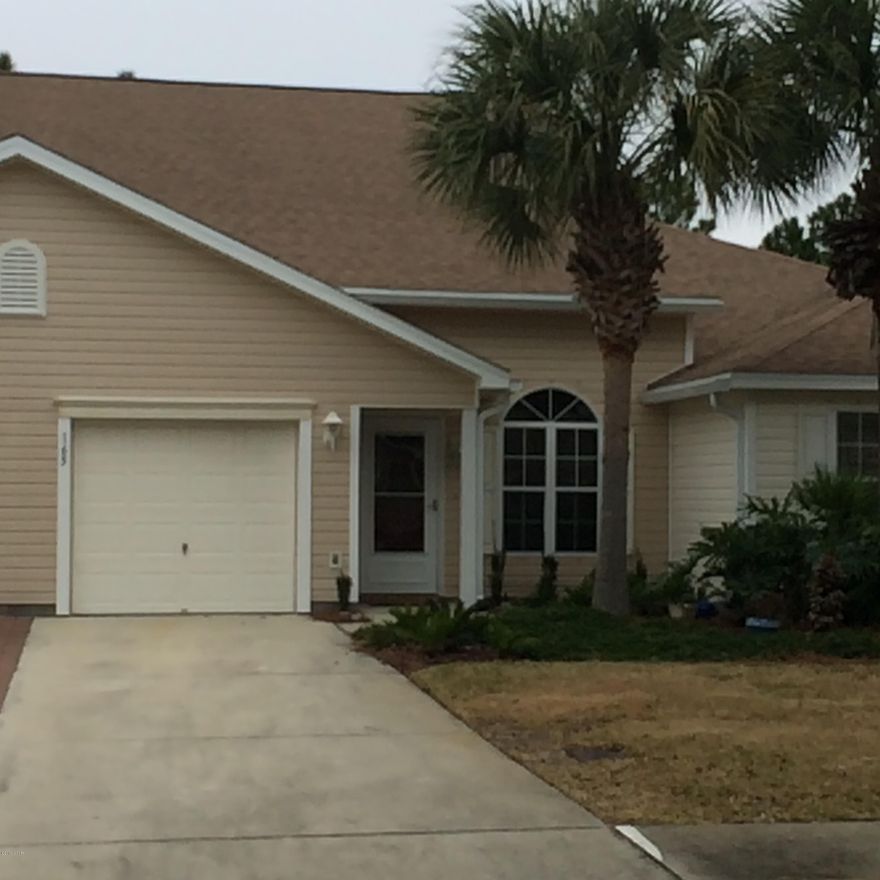 Great large three bedroom town home in highly sought after Palmetto Trace subdivision.  Situated just minutes from the Pier Park shopping complex and some of the area's best restaurants, you'll appreciate the opportunity to live so close to the beach and shopping.  The master bedroom is located on the ground floor.  The living and dining area was upgraded to wood laminate flooring for easy care.  The kitchen features upgraded cabinets and includes all appliances.  There are two bedrooms with a ''Jack-n-Jill'' bathroom on the second level as well as a loft area perfect for home office, children's play area, or a small home theater.  You'll enjoy the views of the conservation area for the screen enclosed rear patio.  The subdivision offers an awesome pool and community gathering area.  Don't miss this opportunity to make this neat and clean town home yours.  Priced to sell, so make plans to see it today!