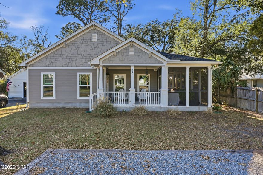 Tucked beneath a canopy of mature oaks in historic Apalachicola, this charming coastal cottage sits just a half mile from the water, offering an easy connection to the town's shops, restaurants, bars, bays, riverfront, and maritime culture. The home features three comfortable bedrooms and two full baths within approximately 1,500 square feet of thoughtfully designed living space. Upgraded finishes such as granite countertops and vanities, stainless steel appliances, plantation shutters, and more. A welcoming front porch sets the tone, framed by lush, established foliage that provides shade, privacy, and a distinctly Old Florida feel. Inside, plantation shutters throughout the home add both elegance and function, filtering natural light while enhancing the cottage's classic coastal character. The interior is tastefully decorated in a relaxed, refined style that complements the historic setting without feeling overdone. The kitchen flows seamlessly into the main living area, creating an inviting space for entertaining or everyday living. Bedrooms are well-proportioned and thoughtfully placed for comfort and privacy. One of the home's standout features is a large screened-in side porch, an ideal spot for morning coffee, afternoon breezes, or evening gatherings, offering an extended living area that embraces the outdoor lifestyle Apalachicola is known for. The landscaped yard feels serene and well-established, with alley access at the rear providing convenient and discreet entry for parking or storage while preserving the home's charming street presence. Overall, this coastal cottage blends historic appeal, tasteful finishes, and livable indoor-outdoor spaces, all just minutes from the water and the heart of Apalachicola. Constructed in 2023 and X Flood Zone. Please take time to view the 3-D virtual tour. Some dimensions obtained from the Franklin Co. Prop Appraiser's Office, please verify if important. Furnishings negotiable.