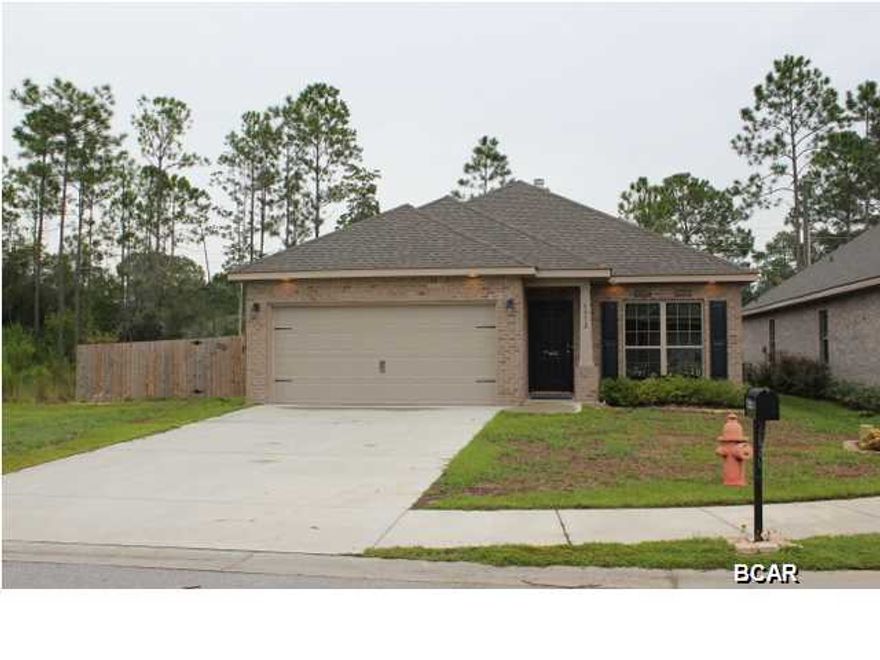 Popular Subdivision in Great School Zones. Home is located in a cul-de-sac and sits next to protected wetlands that will not be developed. No upgrade missed! Gourmet kitchen, perfect for entertaining, Granite countertops with large kitchen island. Kitchen opens up to the living area with direct access to large backyard. Front room can serve as a formal dining area, study, game room or playroom. This home is full of upgrades and custom designs, including custom built master-bedroom closet. Centrally located! Close to Tyndall AFB and Panama City Shopping. Less than 1 mile from the New North Bay Haven Charter Academy, Lynn Haven Recreation Park, dog park and walking paths. Don't miss out on this must see home! Schedule your showing now. ALL MEASUREMENTS are Approximate if important