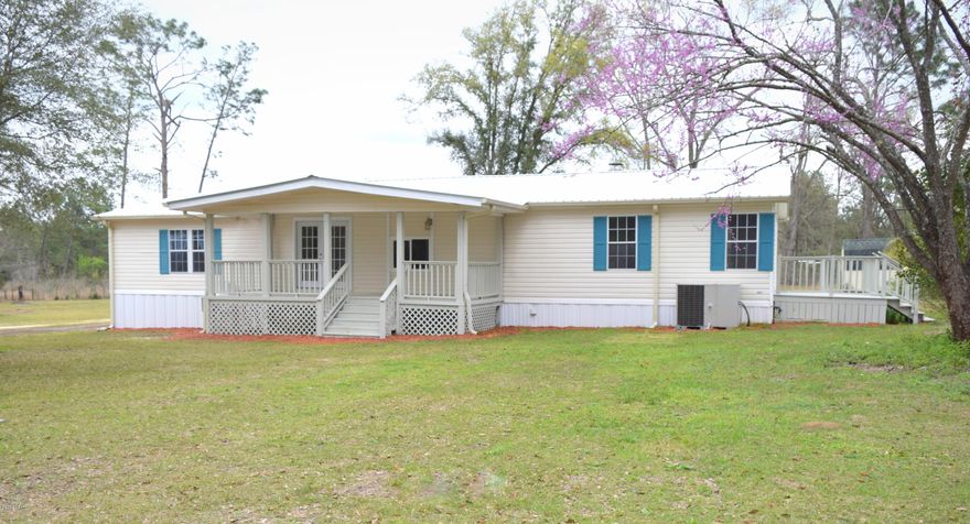 This beautiful 20 +/- Acre pondside property has everything needed to live the country life right. Located minutes from Chipley it boasts a 30x40 shop with 11ft lean-to, 24x24 pole barn, livestock pens, partially fenced yard, front and back porches with a therapeutic swim pool. The 3BR/2Bath triple wide mobile home features an open concept, split floor plan, living area with wood burning fireplace, spacious kitchen with an abundance of cabinets and breakfast bar, large master suite with multi-jetted tub/shower and an oversized walk-in closet. Property is located close to Hwy 77 a short drive to restaurants, shopping and I-10.