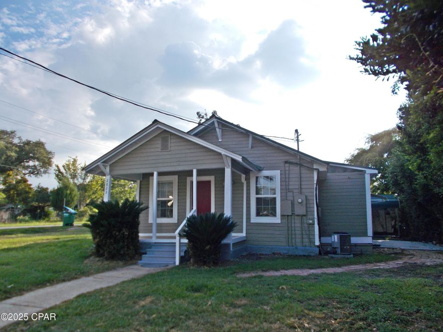 Nicely updated home on corner lot, metal roof, updated windows. New laminate flooring, some new doors, new ceiling fans, new stove, ref. w/d new bathtub, vanity, commode. New paint inside and outside. new 2 car carport installed paved driveway A./C has been serviced. Move in ready.