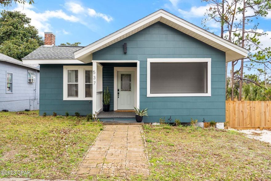 Current under contract, seller considering back up offers. This is truly a rare find! ZONED COMMERCIAL and a completely remodeled 1925 home that sits on .32 acres in Downtown Panama City/Cove area! This oversized corner lot with 111' frontage on Business Hwy 98 has so much potential. 

Previously used as a residential rental, this property is zoned commercial and can be used for a business or office or continue as a residential property. This would be ideal for a business that needs office space but also needs secured storage for work vehicles, equipment, etc. on site! The privacy fence offers a gate on Hamilton Avenue with access. The privacy fence on the property is not indicative of the property lines so there's much more potential for enclosed fence space. Just blocks from Harrison Avenue and Ascension Sacred Heart, this property is in a Prime Location!

The home is a beautiful 2 bedroom, 1 bath offering a modern boho vibe with new plumbing, electrical, HVAC, windows, exterior doors, roof, insulation, sheetrock and a 100+ year old clawfoot tub that was restored. The concept for the remodel was carefully thought through and planned out to keep the original character intact but with new modern finishes and fixtures. 

This would also make for a great rental property to add to anyone's current investment portfolio with its close proximity to all that historical downtown Panama City has to offer. Traveling nurses, visitors downtown, etc. The AIRBNB potential is endless! Or long term rent for stability in your investment. 

Don't miss this opportunity to purchase a COMMERCIAL property in Downtown Panama City where business is booming!