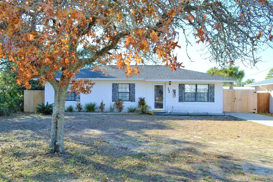 WALKING DISTANCE TO THE BEACH - 100% FINANCING AVAILABLE! The interior of this move-in ready home features 3 bedrooms, 2 bathrooms, a good floor plan, ample natural light and interior laundry. The kitchen boasts new stainless steel appliances, a breakfast bar, an adjoining dining area, a good size pantry and a kitchen sink window overlooking the backyard. The exterior features a NEW 2018 Roof, a 60x154 lot, a backyard big enough for a pool, a patio for grilling, a storage shed, and a side double gate for backyard boat or vehicle access/parking. This home is centrally located to Pier Park, Restaurants, Schools and Shopping.  No HOA!  Call today for your own private preview. Information derived from seller and public record; buyer to verify. Measurements approximate.