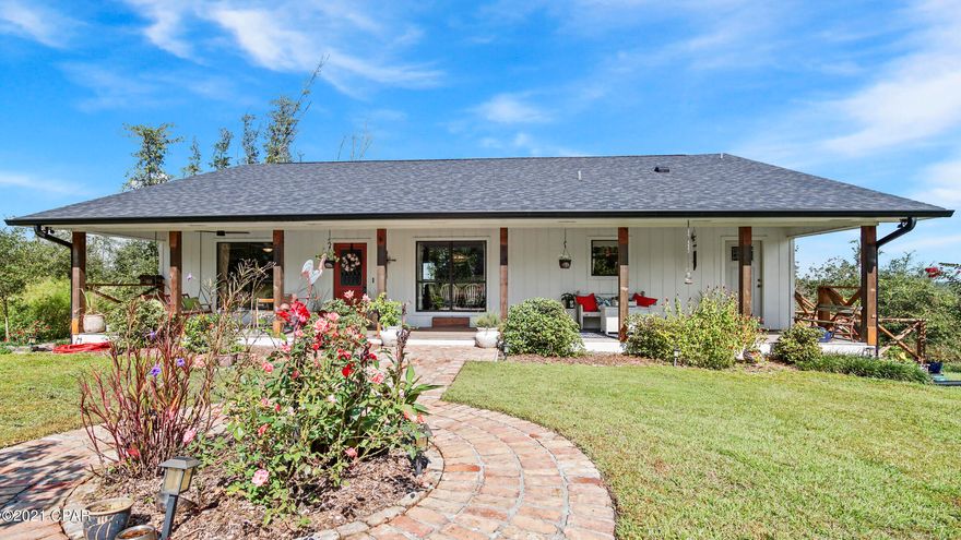 CURRENTLY UNDER CONTRACT, SELLER ACCEPTING BACK UP OFFERS. Get ready to enjoy tranquil and peaceful Country living! Spacious updated waterfront home located on Bear Creek, leading to Deer Point Lake. This charming 4 bed/3 full bathroom home features large front and back covered porches along the length of the home and all rooms at the back of home have water views. Master bedroom has great water view, large walk-in closet and French doors leading to covered porch. Kitchen has stainless steel appliances, quartz countertops, lots of cabinets and large pantry. Beautiful 3/4'' character grade Hickory flooring in main living area and bedrooms on the first floor. Basement  level has a 600sqft Mother-in-law suite with kitchenette and new bathroom with claw foot tub. Oversize 2 car garage w large workshop also on Basement level. Situated on 1.05 acres with fenced back yard, a chicken coop and only 1.5 miles to public boat ramp. Seller will provide One year AHS Home Warranty up to $500 with acceptable offer. Home has a Transferable Termite Bond and an extensive list of upgrades including full Septic Tank replacement(2017), New Roof (2019), New HVAC system (2020). Call Today!!! All measurements should be verified by Buyer if deemed important.