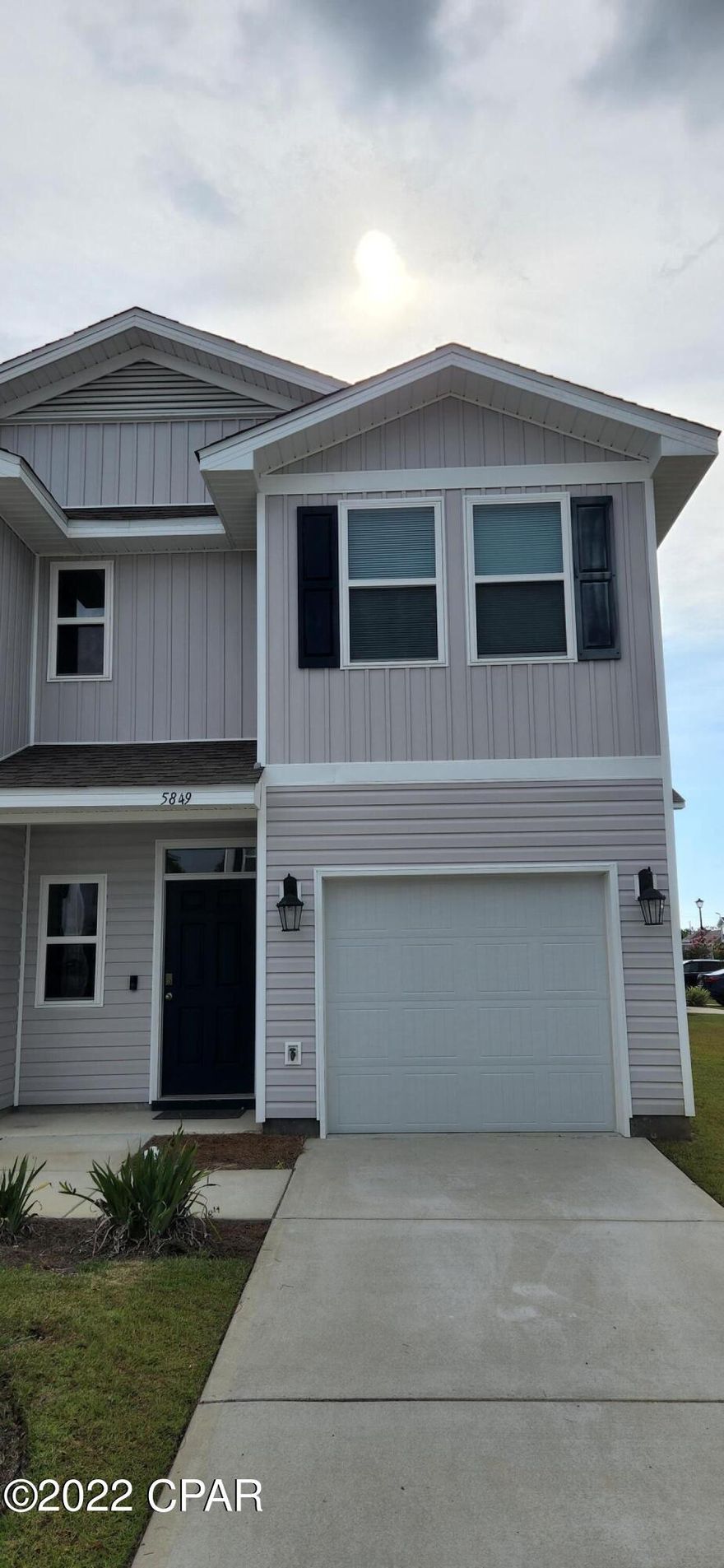 3 bedroom 2 1/2 bath unit in Sentinel Point. Unit offer vinyl plank flooring and carpeted bedrooms. Kitchen is open to the living area and offers a breakfast bar. Fenced in back yard, washer and dryer in unit.  Smart Home Close to Tyndall AFB and shopping. Community offers pool, trash service and grounds keeping. Sorry NO PETS