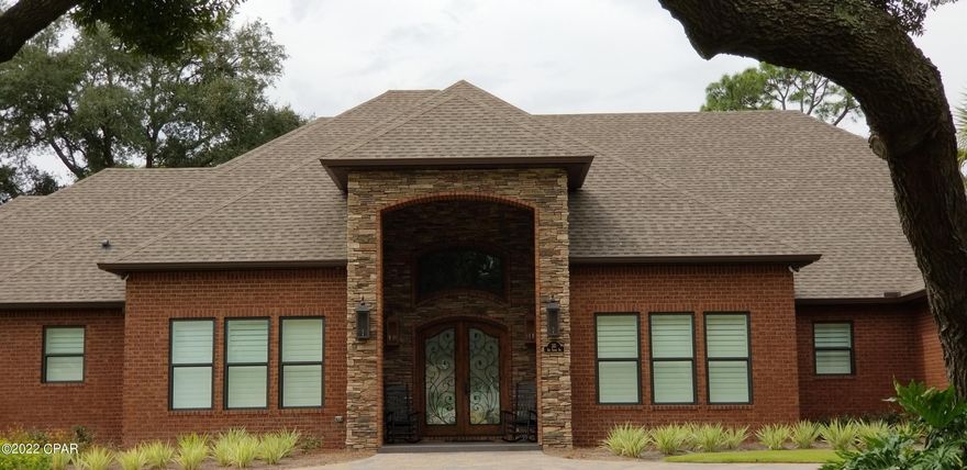 1 ACRE/WATERFRONT!! ONE OF A KIND CUSTOM HOME.  Almost 8500 Total Sq Ft with a BOATHOUSE and TWO BOAT LIFTS.  Screened in Pool Overlooking the Canal and Water Toys.  This Beautiful Home Features a wonderful Open Floorplan...As you walk in the Tremendous Double Wood and Iron Front Doors you enter the 18 foot high Foyer and can see through to the FOUR PANEL Sliding Glass Doors overlooking the Screed in Pool and Canal.  The Chef's Kitchen left no detail out.  From the 60 inch Six Burner Gas Stove with Two Ovens (With Pot Filler) to the Wall Oven/Microwave Combo UNIT with Warming Drawer to the 48 inch Side By Side Built In Refrigerator to the Eat In Breakfast Table and Bar...The Kitchen alone can seat 12 people, not including the Formal Dining Room.  The Master Suite is a true Oasis. The Spacious Master Bedroom has a large Electric Fireplace under the 65 inch TV that drops out of the Ceiling.  The oversized His and Hers Closets feature Built In Custom Furniture and the 2nd Laundry Room is right between the two closets...  But the best part of the Master Area is the Spa Bathroom.  The separate sink areas split the room and are on either side of the wonderful soaking tub which sits in front of a shower to out of this world...the back wall of the 10 foot high shower is adorned with 2 each, 5 foot wide by 10 foot tall Book Matching Porcelain Slabs with Black Stone Accents on either side.  The Bathroom Floor is Beautiful 24 x 24 Porcelain Tile.  A Must See!!  One of the Additional Bedrooms currently acts as a Home Office and has it's own Full Bath.  The other two Bedrooms are Jack & Jill Style with each having their own separate Sink Area.  Upstairs is the ultimate Media Room/Man Cave/Game Room...Three 75 inch TVs are on one wall and a Wet Bar is on the opposite wall.  At the far end of the Room is an 8 foot Pool Table.  The room has tremendous storage areas behind the walls, a large closet, and A Full Bath round out the upstairs.  A great Mud Room leads to a Small Workout Area under the Stairs and the 2nd Laundry room for your guests.  As you exit the Mud Room the Garage you will be amazed...The Garage is an Oversized 3 Car (or Truck) Area with extra Storage/Workshop.  The Garage is 1800 Sq Ft and it has Its own HVAC System.  The House also has Impact Windows throughout and the entire house and Roof deck is Spray Foamed for your energy efficient Comfort.  Its a Smart Home has wonderful Millwork 2 gas Tankless Water Heaters and just so much more and too much to list here... A must see!!
(Media Room could be converted to two more bedrooms if needed)