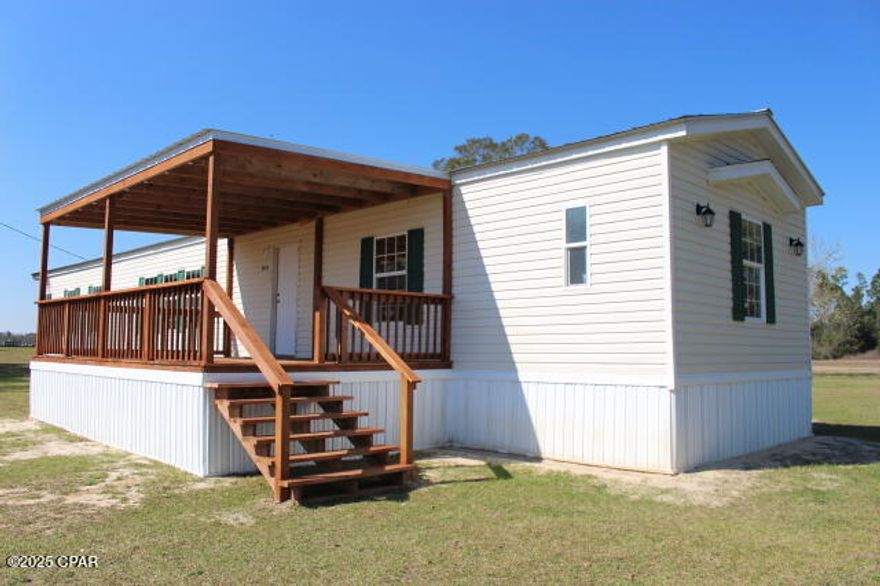 Country Living on 1 Acre with Modern Comforts!  This move-in ready, immaculate 3-bedroom, 2-bath split bedroom floor plan offers the tranquility of country living while being conveniently located just 20 minutes from Marianna and under 30 minutes to Dothan, Alabama, for dining, shopping, and entertainment. Enjoy peaceful country views and easy access to the Chipola River and Chattahoochee River for fishing, plus Blue Springs for swimming and diving. The bright, spacious kitchen boasts plenty of windows to take in the views, and the home features vinyl plank flooring throughout (with one room carpeted). All appliances convey, making it truly move-in ready. Perfect for those working in corrections—you'll appreciate the short commute home for lunch. Nearby, you'll find excellent schools like Malone School and plenty of local amenities like Walmart, Lowe's, and restaurants. Exercise and family fun are just a short drive away with a local park for both workouts and playtime. Don't miss out on this opportunity to experience country living without sacrificing convenience!