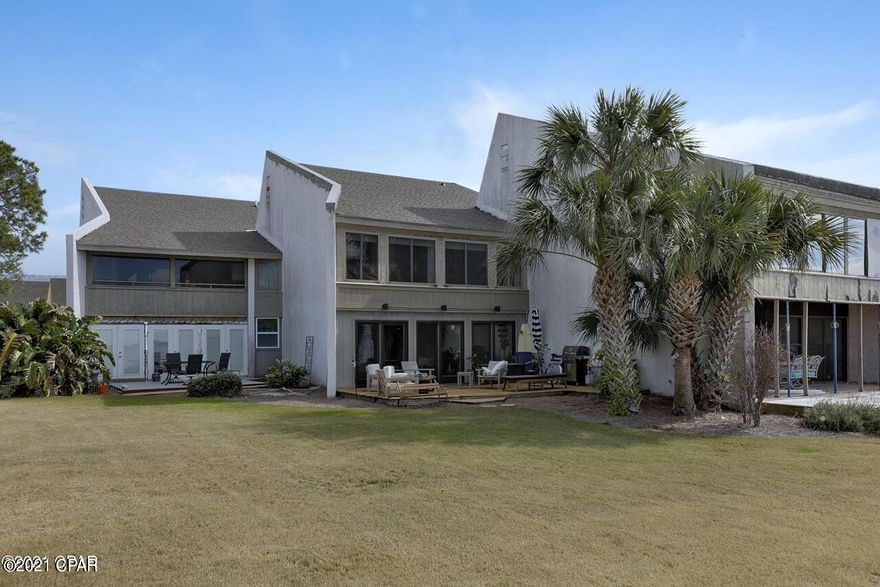 Contingent - Taking Back Up.  Location and timing is perfect for this opportunity as Bay County's finest boats return home to the NEW marina.  Your chance to make this lovely condo your primary or secondary home is now!  This upstairs condo has 2 and a half baths, privacy with one bedroom on lower floor and guest bedroom and bath on upper floor.  All furniture remains with condo.  Custom storage added in cabinets and closets.  Harbor Villas has completed storm repairs to include new roofs and fresh paint to exterior.  New landscaping to add to the home enjoyment.  Beautiful sunset and marina views!  Short term rentals allowed.