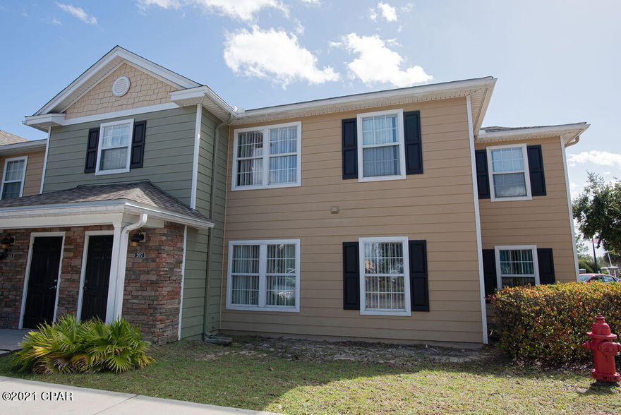 This is YOUR opportunity for a ground floor corner unit at Nautilus Cove!   This 3 bedroom, 2 bath condo has been meticulously maintained to look like brand new.  The floor plan is split for great privacy with the master bedroom separate from the 2 other bedrooms.  The interior is very spacious with abundant storage and bright light from the west facing windows.  The kitchen has granite countertops, maple cabinets and a FULL stainless appliance package (the washer and dryer is even included). There is plenty of room for dining in the dining area AND the breakfast bar area.  The living room is open to the kitchen and dining room.  There is even a dedicated parking space right in front of the entrance door.  Nautilus Cove is popular for its location close to the beaches and Pier Park. The resort style feel is very welcoming with a large pool area, fitness center, club house and playground for the kids.  Three bedroom bottom floor condos are pretty rare for the area and they sell fast!  Call your Realtor today to set up a time to take a look.