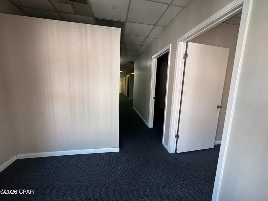 Located just west of the Hathaway Bridge in the open air Promenade Mall, this second floor office/retail space is currently configured for an office user, but could easily be built out to accommodate any retail user.