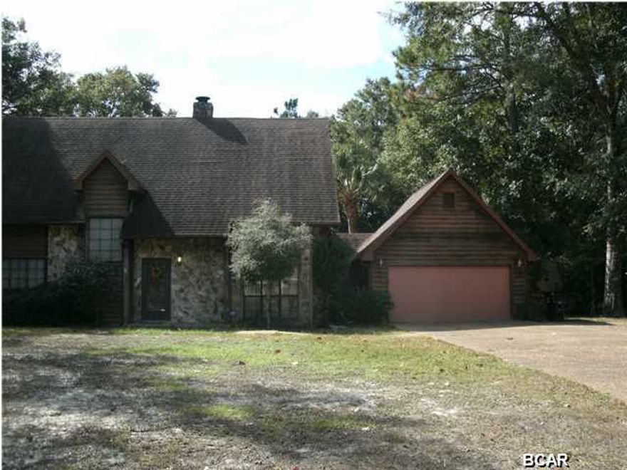 ALL SIZES APPROX: BEAUTIFUL CONTEMPORARY STONE AND SIDING CUSTOM BUILT HOME CLOSE TO TYNDALL. MANY STONE ACCENTS INCLUDING CORNER FIREPLACE. BUILT FOR AN ACTIVE FAMILY. IN-GROUND POOL SURROUNDED BY LARGE CONCRETE PATIO AND 6 FOOT PRIVACY FENCE. ENTIRE BACKYARD FENCED IN CHAIN LINK INCLUDING A SEPARATE DOG RUN. LARGE 12X20 STORAGE/WORKSHOP WITH ATTACHED 12X20 CARPORT, PERFECT FOR THE BOAT! UPSTAIRS ARE TWO BEDROOMS, FULL JACK AND JILL BATH AND A LARGE OPEN LOFT. GENEROUS MASTER BED AND BATH DOWNSTAIRS NEAR THE LIVING AREAS. LAUNDRY ROOM AND LOTS OF EXTRA STORAGE UNDER THE EAVES AND STAIRS PLUS A OVER-SIZED GARAGE AND DRIVEWAY. TRANSPARENT DETACHABLE HURRICANE SHUTTERS. 2 HVAC UNITS.