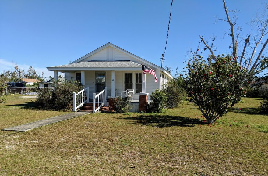 Gorgeous Florida Cottage with all the charm and character of years ago, with many new conveniences of today. Up graded electrical system, central heat and air, new roof and easy maintenance vinyl siding. This 3 bedroom 1.5 bath home is situated on .4 acres close to Tyndall AFB, Eastern Shipbuilding, the Mill and restaurants and shopping. Also has a concrete pad ready for a new garage/shop.  Immediate occupancy, move in ready. Furniture is negotiable.