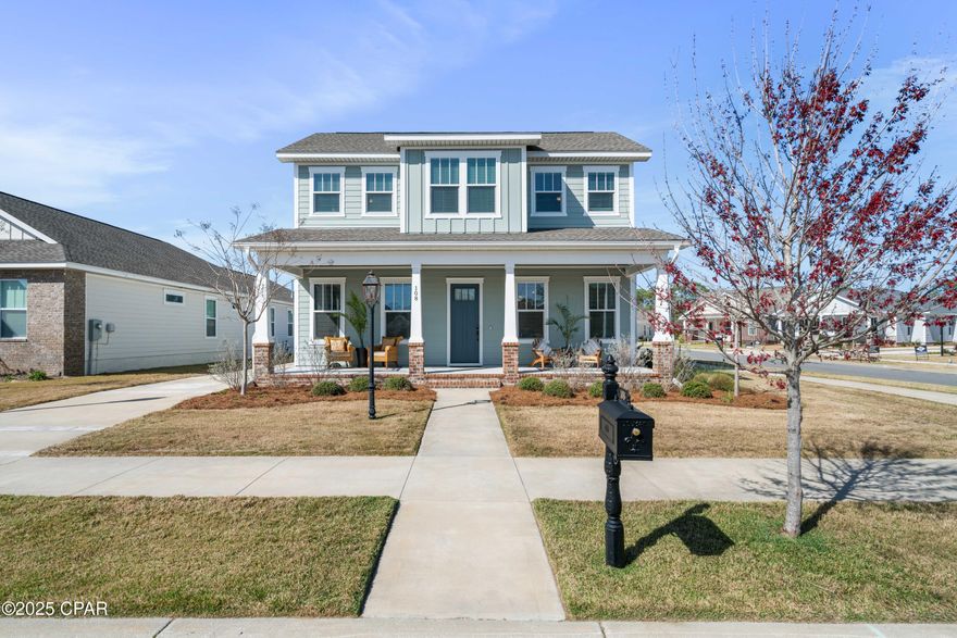 Located just blocks from the beach, this exceptional 4-bedroom, 2.5-bath, two-story home seamlessly combines modern design with relaxed coastal living. Situated in the amenity-rich Tapestry Park community, homeowners enjoy access to two resort-style pools, lighted sidewalks, expansive green spaces, a playground with slides and swings, tennis  and pickleball courts, a basketball court, and a clubhouse featuring a full kitchen, ideal for private events and celebrations. Upon entry, the home welcomes you with a bright, open-concept living space highlighted by striking exposed wood beams that add warmth and architectural character. The spacious living area flows effortlessly into the gourmet kitchen, creating an ideal setting for entertaining. The kitchen is thoughtfully designed with a gas range, vented hood, and microwave integrated into a large quartz island, offering both style and functionality. A generous walk-in pantry with custom shelving provides ample storage.

The first-floor primary suite is a true retreat, featuring a charming barn door for added character and privacy. The spa-inspired primary bath showcases elegant gold fixtures, quartz countertops, and an oversized walk-in tiled shower, along with a spacious dual ''his and hers'' closet layout. The laundry room is conveniently located on the main floor near the primary suite. Additionally, a functional mudroom just off the rear-entry garage and covered porch offers the perfect space for coats and shoes.

Upstairs, you'll find three generously sized bedrooms, each offering flexibility for family, guests, or a home office. A well-appointed full bath serves the upper level and features modern finishes with quartz countertops. Throughout the home, recessed lighting and cottage-style trim and casing add a clean, contemporary aesthetic.

No detail has been overlooked. The owners have added a professionally installed whole-home dehumidifier (see attached upgrade list for full details), along with smart light switches and a smart thermostat for convenient remote control. The garage is equipped with Magic Stairs for easy attic access and additional storage, operated by a remote. Exterior upgrades include newly installed pavers, a premium leaf-guard gutter system, and a screened-in porch, perfect for relaxing and enjoying morning coffee.

This thoughtfully designed home offers an exceptional blend of coastal charm, modern convenience, and refined elegance. Don't miss this incredible opportunity, schedule your private showing today.