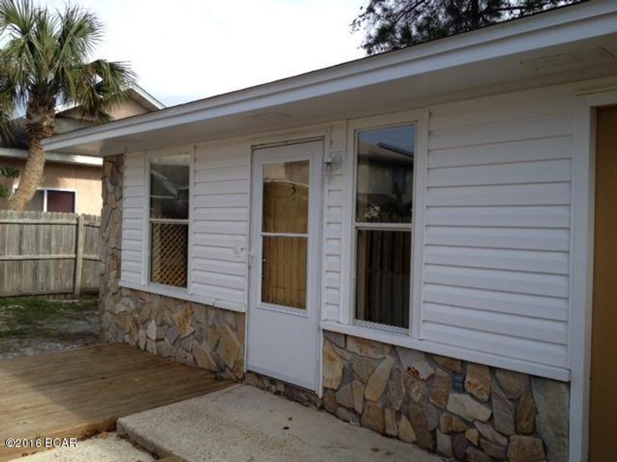 Just a short walk to the beach. This is a 2 bedroom 2 bath tri plex unit located in the S Lagoon area of Thomas Drive.  This unit features tile floors, breakfast bar and laundry room.