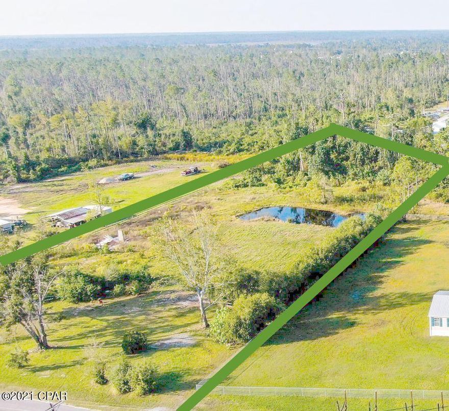 Don't miss out on this beautiful acreage!  This 2.67 Acre parcel is conveniently located in the East Deerpoint Lake area, close to great fishing, schools and larger than typical homesites.  This lovely lot is partially cleared and even boasts a small pond... so you can stock your own/catch your own.  The possibilities are endless.  Perfect spot for the your new home or perhaps even a  barndominium.  (All info is approx and buyer to verify anything that is important, including zoning/measurements/ schools/etc. Land sold As Is, seller has no knowledge of whether or not there is elec, well, septic, zoning, or if any existing items are working.)