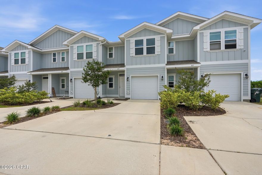Welcome to 1635 Caleigh Court. This home offers the perfect blend of modern style, everyday comfort, and low-maintenance living in the heart of highly sought-after Lynn Haven. Built in 2021 and thoughtfully maintained, this move-in ready townhome features 3 bedrooms, 2.5 bathrooms, and over 1,400 square feet of beautifully designed living space filled with natural light. The open-concept main level boasts 9-foot ceilings, luxury vinyl plank flooring, and a bright, airy layout ideal for both relaxing and entertaining. The kitchen overlooks the living and dining areas and is beautifully appointed with granite countertops, shaker-style cabinetry, stainless steel appliances, a large pantry, breakfast bar seating, and clean modern finishes. A convenient half bath downstairs adds extra functionality for guests.

Upstairs, the spacious primary suite serves as a private retreat with a walk-in closet, dual vanities, and a large walk-in shower with glass enclosure. Two additional bedrooms are thoughtfully positioned on the opposite side of the home for added privacy and share a full bathroom. The second-floor laundry area adds everyday convenience. Additional highlights include a one-car garage, double-wide driveway, and a covered back patio.

Enjoy a truly simplified lifestyle with HOA services that include lawn care, exterior maintenance, and quarterly power washing, allowing you to spend more time enjoying your home and less time maintaining it. Conveniently located near shopping, dining, schools, and major roadways, this turnkey Lynn Haven townhome is an exceptional opportunity for primary homeowners, first-time buyers, or investors alike.