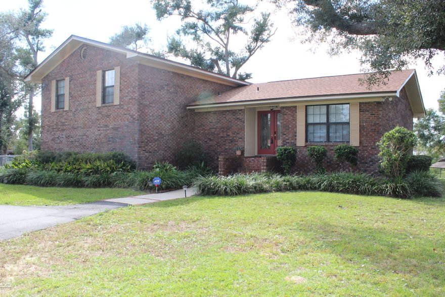 Major price reduction on this one owner home located on a waterfront lot on Deerpoint Lake!  This home has been meticulously maintained and is ready for a new family to enjoy the lake life.  Sitting on over a half acre lot this property has multiple live oak trees that survived Hurricane Michael.  The home has had some updates such as the ceramic tile, crown molding, and an updated master shower.  Seller will give a $5,000.00 buyer credit at closing for flooring/other updates with an acceptable  offer.  Schedule your showing today!