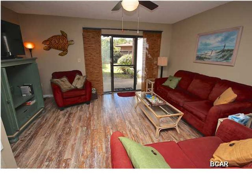 This 1,120 sf, 2 BR/1.5BA Portside condo has everything you are looking for. Unit J3 is being sold fully furnished and would be a great rental unit SLEEPING UP TO 12 PEOPLE! Portside is a very nice family oriented complex surrounded by beautiful tropical landscaping located on the west end of Panama City Beach. It's across the street from the beach with easy access. There are three pools, hot tub, tennis courts, shuffleboard courts, and a club house. Portside is located on the desirable WEST END and is very close to numerous restaurants and shops. Whether you want a primary residence, second home or investment property, this is the place for you!