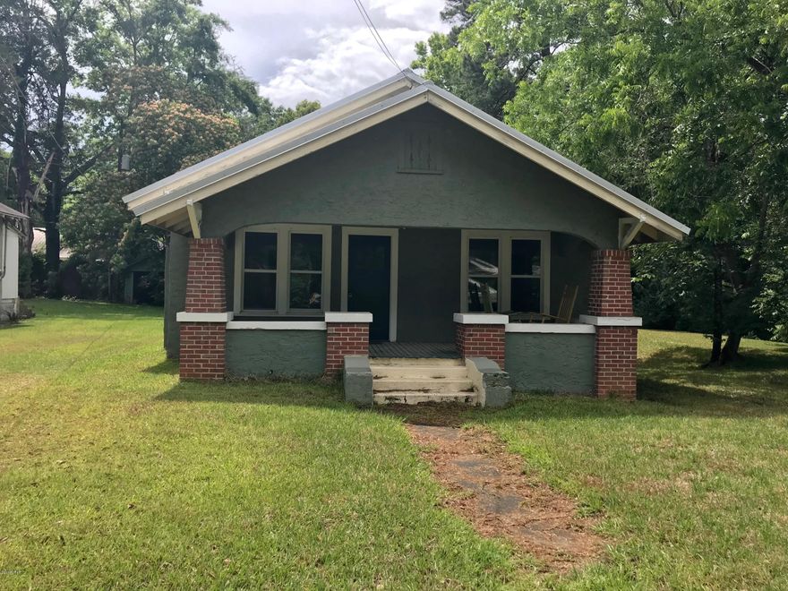 First time home buyers or for those downsizing this is a fantastic buy in a great location!! The owners are currently remodeling and just about finished! More pictures to come upon completion. This adorable home has a completely remodeled kitchen, with whirlpool glass top oven and new dishwasher, remodeled bathroom, hardwood floors, new metal roof, upgraded electrical panel, new windows and an enclosed porch. Right in the heart of Marianna.