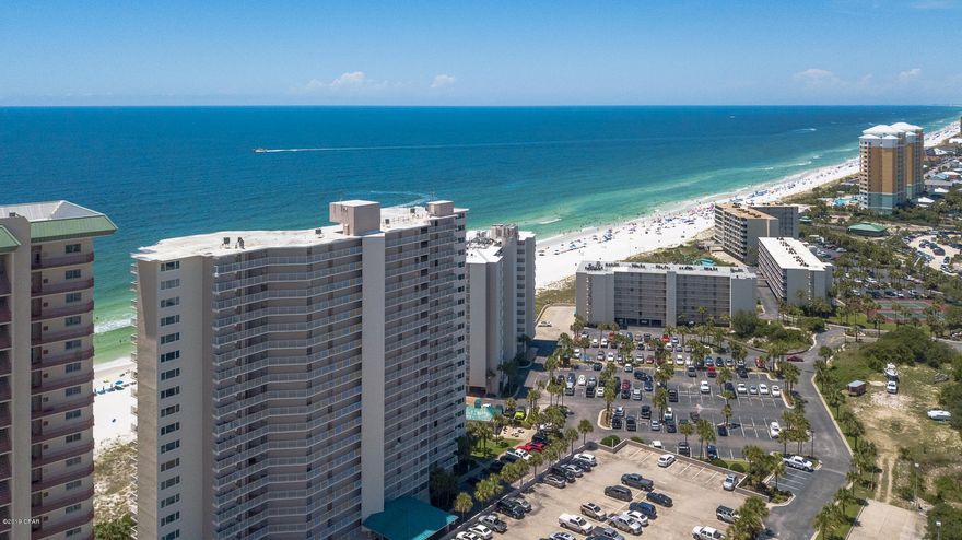 OWNER FINANCING OPTION !UPDATED!!!  GULF FRONT 2BR/2BA Condo in Dunes of Panama.  This well laid out unit has a gulf front living area & a very large gulf front master suite with sliding glass doors leading to your own private balcony. Dunes of Panama has 3 pools, clubhouse, tennis, shuffleboard, fitness room, Snack shop and a place to grill. This has been a great rental!