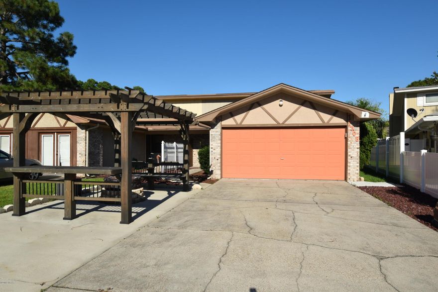 Great starter home or investment opportunity with a gorgeous view of Goose Bayou!! Home is getting a new roof; not due to hurricane damage, but due to age.  Home had very little Hurricane damage.  This home is centrally and conveniently located in Panama City, between Tyndall AFB and the Navy base. Only minutes away from shopping, schools, and restaurant. Venetian Sunset Park is located across the street, where you can enjoy the peaceful tranquility of Venetian Villa while you watch the sunset over Goose Bayou. The driveway is oversized and can accommodate up to 6 vehicles! The home has been updated with newer appliances and the open floor plan spans over 1300 sqft. A Murphy bed in the guest bedroom (including a new mattress) maximizes room space. This home comes with a storage loft overlooking the living room, accessed by drop down stairs; perfect for your holiday decorations, crafts, keepsake.  An open bonus room next to the living room makes the perfect den, exercise room, or child's playroom.  Call for your private tour today ... it won't disappoint! Measurements approx; verify if important.