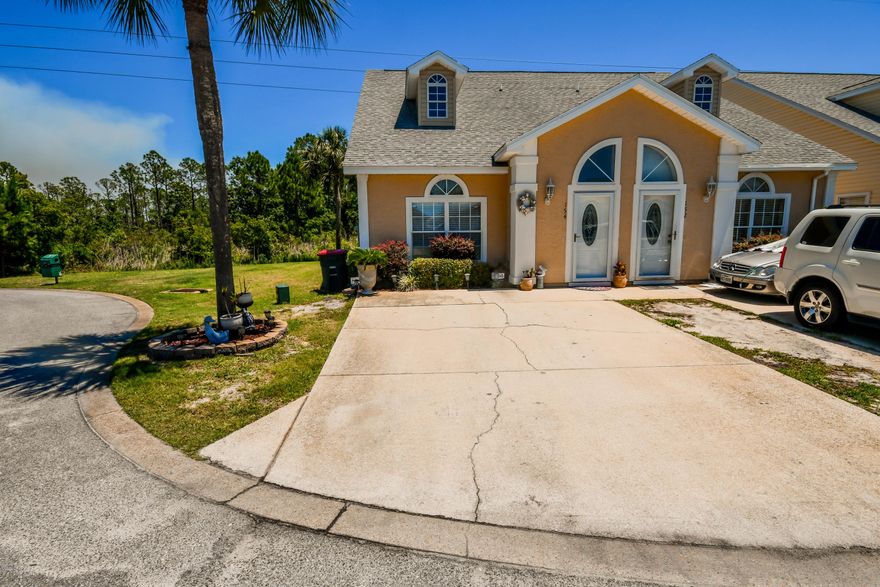 This Palm Cove treasure is a sight to behold! It is decorated and furnished like a luxury home. It's an end unit town-home with 3 bedrooms and 2.5 baths, and it's immaculate. All of the appliances are stainless steel and there is a lighted walk-in pantry. The Master Bedroom is on the first floor and there is a lovely screened porch where you can enjoy the pretty view of the conservation area and a pond. The upstairs bedrooms each have walk-in closets. home is on a cul-de-sac. which means that no neighbors to the left just a nice open grassy area., Plus this unit has a dinning. Palm Cove is a great centrally located neighborhood with two community pools and you're just around the corner from the beach, golf courses and several shopping centers.  Walking distance to the beach shopping Shipwreck water park, Rocket Lanes, 5* restaurant Firefly, Saltwater Grill, Walmart, Sonic and so much more..