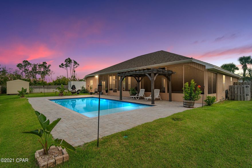 Spacious home in Mowat Highlands on a cul-de-sac with a gorgeous saltwater pool. This 2,248 sqft home offers a split floor plan, 3-bedrooms, 2.5-baths plus formal office with French doors, formal dining room and screen enclosure lanai out back. Living room with corner fireplace, built-in cabinetry and shelving, Kitchen has stainless steel appliances, granite countertops and breakfast area. There's a convenient guest half bath off the lanai for pool parties and a beautiful pergola next to the pool. Fenced backyard, where you will find a storage building and concrete pad for boat or RV storage. The 15x30 gunite saltwater pool has underwater lighting for night time enjoyment. Spacious master bedroom suite connected to tiled bathroom, jetted tub and shower, and with exterior door to the lanai. Brand new flooring in the office, new electrical panel and HVAC just serviced. All measurements are deemed correct, buyers should verify if they are important.