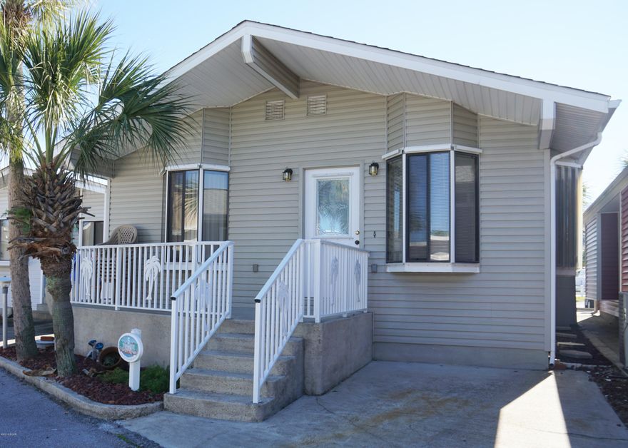 Great 2 bedroom, 2 bath home with an amazing location. The home is very close to the front of Venture Out resort, making your walk over to the beach a breeze.  You will love the large kitchen with breakfast bar and good size living room. As a bonus you have a large owner's closet for all your beach storage. It doesn't get better than this! Venture Out is a golf cart community that has 300' on the beautiful pristine beaches of the Gulf of Mexico and 1,000' on the Grand Lagoon. Venture Out has something for everyone. With two salt water pools (one heated), fishing pier, boat ramp, mini golf, children's play ground and much more.