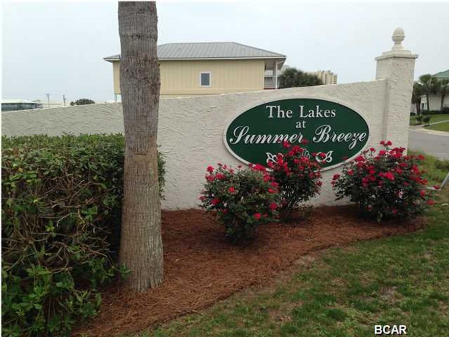 Walk to the beach from your waterfront property on The Lakes of Summer Breeze, the most prestigious subdivision on the west end of the beach. Picture your dream home on this lot ready to build with the seawall already in place. Located near Pier Park, and only about 1/2 mile from Hwy 79 on Front Beach Road.