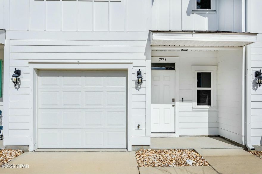 Currently Under Contract - seller accepting backup offers.     ** MOTIVATED SELLER**. Lowest priced unit in Hathaway Townhomes.   
Welcome to this freshly updated 3-bedroom, 2.5-bath townhome, featuring fresh paint and brand-new carpet, located  in the highly desirable Hathaway Townhome community! Built in 2021, this 1,496 sq. ft. home offers the perfect blend of modern design and low-maintenance living.  Step inside to find an open and inviting floor plan featuring luxury vinyl plank flooring in the 1st floor living areas and all new carpeting in the 2nd story and bedrooms. The open kitchen is complete with granite countertops, stainless steel appliances, and ample cabinet space, making it ideal for both everyday living and entertaining.  This townhome also boasts its own attached garage and three driveway spaces, providing both convenience and extra storage. Plus, it's just steps away from the community pool, perfect for enjoying Florida's sunny days!  Located just minutes from the beach, Pier Park, the Navy Base, and downtown Panama City, this home offers easy access to everything the area has to offer. The HOA takes care of exterior insurance, trash removal, lawn care, and pool maintenance, allowing you to enjoy a truly hassle-free lifestyle.  Whether you're searching for a primary residence or a lucrative short-term rental investment, this Hathaway townhome is a fantastic opportunity. Don't miss out—schedule your showing today!