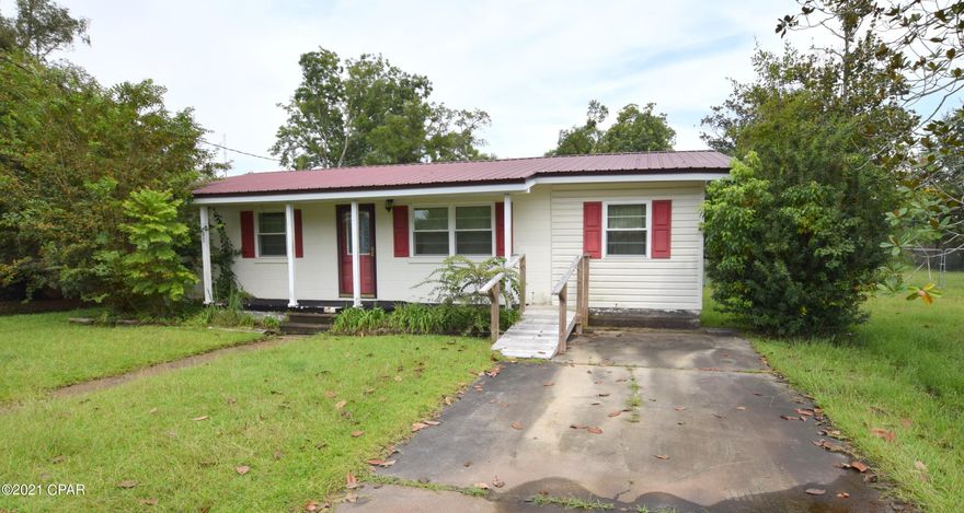 Located directly across from Shivers Park in the heart of Chipley sits this charming 2 bedroom, 2 bath beauty. Walk inside and you will find an open concept kitchen/living room, office, bedrooms with hard wood flooring and a spacious laundry room with full bath. Outside features include a metal roof, covered front porch, fenced back yard and 2 detached storage sheds. Home is located walking distance of hospital, schools and shopping.