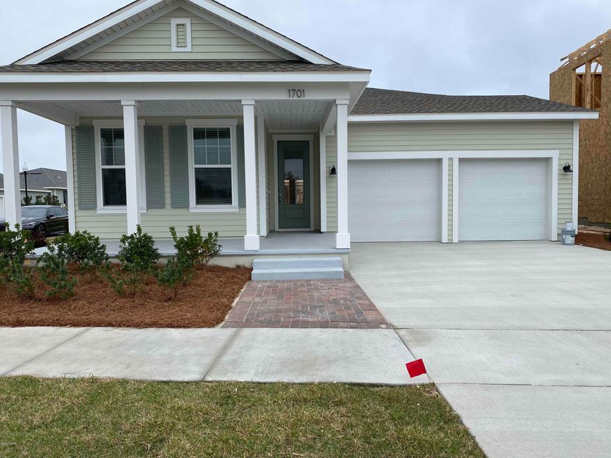 The Anna Maria plan by Samuel Taylor Homes is a popular open plan with a wonderful owner's suite. Relax on your front porch and take in the Bay breeze or have fun entertaining on your large covered patio in the back! Plenty of beautiful large windows for natural light, 10ft ceilings, granite countertops and stainless appliances, and designer kitchen cabinets are just a few of the luxury features included in this home. The fantastic amenities at Sweetbay are unlike any other community in Bay County - North Bay access for fishing, kayaking or paddle boarding, pocket parks, resort-style junior olympic pool, basketball and sports court and miles of trails. New home buyers in SweetBay also receive priority access to top-rated University Academy! Welcome center open daily!