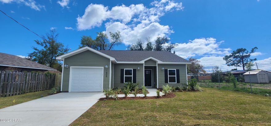 UNDER CONTRACT ACCEPTING BACKUPS Welcome to Your Dream Home in the Heart of Town!
Experience the epitome of modern living with this brand-new construction nestled in an unbeatable location. Perfectly positioned for a vibrant lifestyle, this home is tailored for the dynamic needs of your family.

Situated directly across from the Oakland Terrace softball field, your family will enjoy instant access to recreational amenities including tennis and pickleball courts, a playground, and the Oakland Terrace Recreation Center - all just steps away. St. Andrews Elementary, Bay County Council On Aging, and an EMS/fire station are conveniently within a block's reach.

Step inside and be captivated by the high ceilings and luxurious plank floors, setting the stage for elegance and comfort. Professionally curated lighting, color schemes, and fixtures add a touch of sophistication to every corner.

Designed to delight the culinary enthusiast, the kitchen boasts soft-close Shaker cabinets, exquisite quartz countertops, LED under cabinet lighting, and stainless steel appliances. The expansive master bedroom features a generous walk-in closet, while the ensuite master bath offers double vanities, a meticulously tiled shower with a custom glass door, and upgraded Level 5 granite countertops.

Elevating your lifestyle, this home is equipped with smart features for convenience and energy efficiency, including LED lighting throughout, WiFi-enabled garage door opener, thermostat, and irrigation system.

Outside, discover your own private oasis with a meticulously landscaped and irrigated lot, complete with a privacy fenced backyard and a charming patio - perfect for alfresco dining and entertaining guests.

With designer interior touches, a garage for convenience, and every detail attended to, this home is move-in ready and awaits the cherished memories of your family. Don't miss out on this opportunity - seize it now before it's gone!