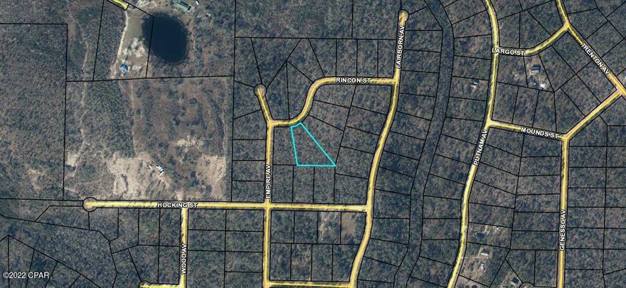 This is a large 1.4 acre wooded lot in the Compass Lake subdivision. Compass Lake (see pic) is an all-sports lake, offering water skiing, tubing, jet skiing, pontooning, power boating, sailing, wakeboarding, canoeing, kayaking and swimming. In keeping with its reputation as a boating lake, a restaurant along the shore is accessible by boat. Most of the shoreline provides a natural sand beach. Located about half-way between Panama City, FL and Dothan, AL, Compass Lake is only 10 miles from Marianna and Interstate 10. The area is rich in historical significance, with many restored antebellum plantation homes open for tours or as bed-and-breakfasts. Nearby Alford holds a grocery store and some basic services, while Marianna contains nearly everything a resident would need. About 30 miles south, Panama City Beach offers public Gulf beaches and marinas for 'big water' boating plus big-city amenities and attractions. The entire area around Compass Lake is filled with unique geological treasures, some of which are state parks. Two well-known attractions near Chipley, Falling Waters State Park and Caverns State Park, both display in spectacular fashion the effect of eons of water flowing across the ancient limestone.