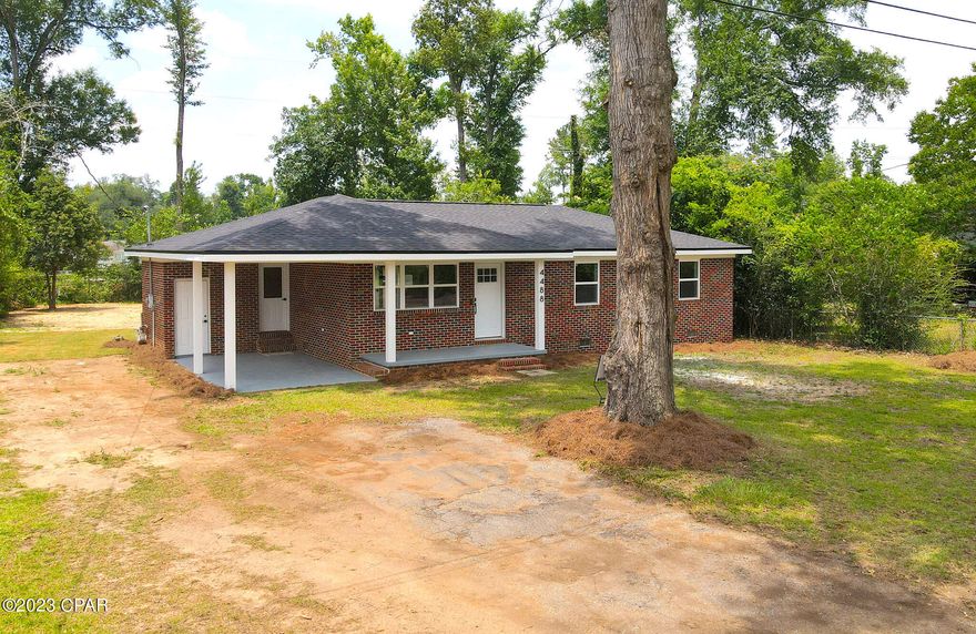 This stunning single family home is the latest rebirth of this quiet mid-century Marianna neighborhood and it is something to behold. Well-positioned on its 0.35 acre lot just a few blocks from downtown, it has just enough front yard to frame its facade, leaving a sprawling backyard that's the perfect space to install a pool, nurture a garden, or just have space for the kids or the dog to run. Originally built in 1975, this 3/2 is just under 1500 sq ft and has been completely updated with a new roof, new windows and doors, new cabinets and quartz countertops, fresh paint and black stainless appliances. Even still, all of those shiny new features pale in comparison to the beauty of this home's revitalized original hardwood floors. Don't miss out on this gorgeous move-in ready home in the perfect location. It won't last long!