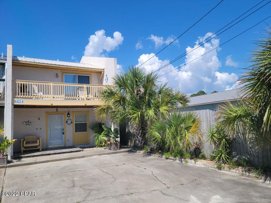 **Multiple Offers - Highest & Best Due Monday, 20 June 2022 at 6pm CDT** One block from Public Beach Access 20. This 2 bedroom, 1.5 bath townhouse comes fully furnished.  3-Ton HVAC system is new. In the utility room you'll also find a new water heater and new clothes dryer.  Kitchen tastefully updated with wood cabinets and granite counters. The stainless fridge, stove/oven and microwave are all new. First floor is tiled, second floor is wood laminate. Fenced backyard is maintenance free...all sand with several decks and a storage closet with cabinets. All this and no HOA fees!  These don't come on the market often. Perfect as a primary home, vacation getaway or investment rental. Call for your private showing today.