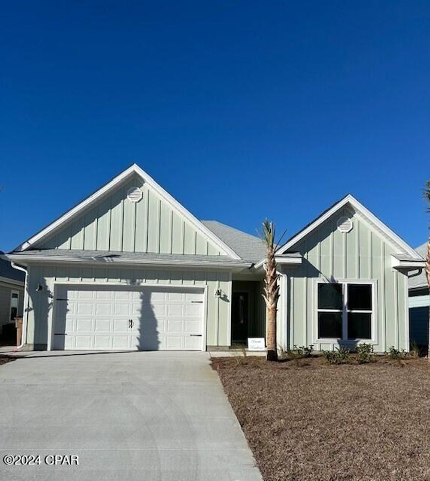 The Kennedy is a 4-bedroom, 3-bath home with 2197 square feet of living space located in WindMark Beach. Standard features of this home include beautiful quartz countertops with undermount sinks in the kitchen and all bathrooms, 5 panel wood doors, engineered vinyl plank flooring throughout the entire home and 9-foot ceilings throughout. Stainless steel appliances included are a free-standing smooth top range, microwave, and dishwasher. The kitchen features a large walk-in pantry, disposal and water filtration system. This unique floor plan features a mother-in-law suite complete with its own entrance, kitchen, bedroom, bathroom, heating and cooling and laundry. WindMark Beach is a tranquil community where one can enjoy the natural settings with boardwalks, walking paths, bike trails, and deeded beach access. WindMark Beach also offers residents numerous luxury amenities and features including a community pool, a gym, restaurants, packaging store/bar, beach equipment rentals, roving security, community fire pit, local shopping, and a versatile community center.