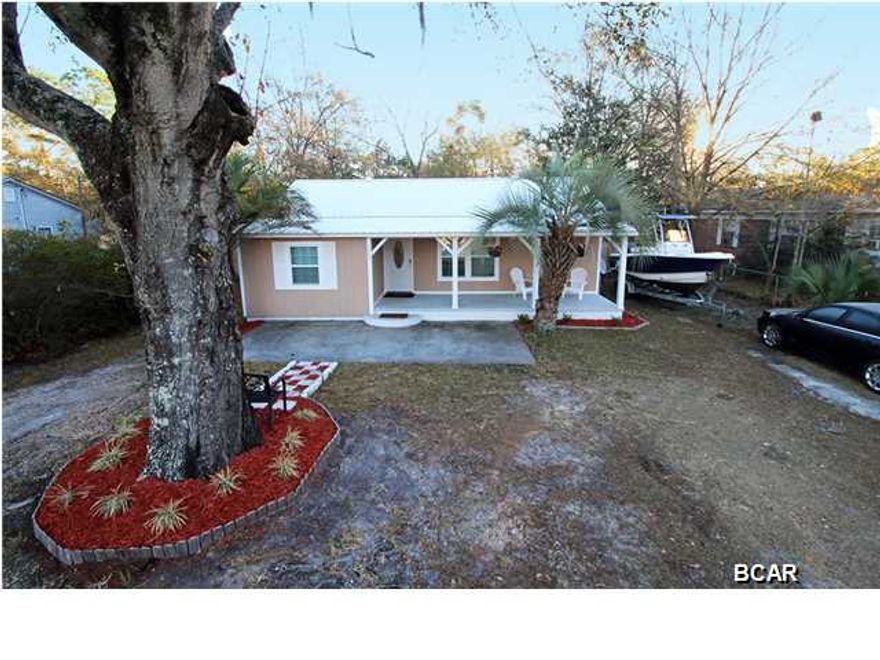 Amazing home priced to sell! This 1740 sq.ft. home has been completely remodeled and has a new effective age of 2010. Located in one of the best school zones in Bay County and just minutes from shopping and dining. Just a few of the updates include a new metal roof, new AC inside and outside, water heater, appliances, plumbing, electrical, exterior siding, flooring, plus much more. When you walk in you'll love the huge living area. This floor plan is perfect for a large family or someone who loves to have guest over and entertain them. The large master bedroom also features a beautiful master bathroom with double sinks and an awesome tiled shower. The backyard has an over-sized 20x30 workshop. This is an incredible deal for this size home in such great condition. Call today!