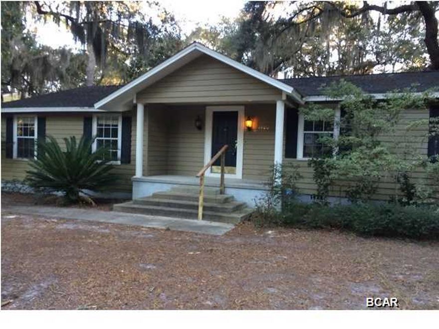 You must see this adorable house in the Cove! Property appraiser says effective year built is 1994. Former owner re-wired, re-plumbed, did lots of upgrades and renovations including adding a huge, luxurious master suite. New carpet was just installed, the walls were just freshly painted, all new appliances just installed and the kitchen cabinets painted! The open floor plan and large deck with built in benches makes it a great place to entertain. The living room and large eat in kitchen are only separated by columns. There's even a wet bar in the living room. The master bedroom is huge and has a beautiful tray ceiling. The master bath is luxurious with a jetted tub, separate shower, water closet , and double sinks. The large laundry room has cabinets and a wash tub. The huge back yard