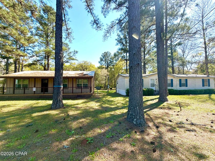 Investor Opportunity!

Two Homes on 1 Acre.

Discover a rare opportunity in Jackson County, Florida near Campbellton, Florida! This unique property features two homes on one acre, making it ideal for investors, house hacking, rental income, Airbnb potential, or multi-generational living.

The main residence is a 3-bedroom, 2-bath manufactured home offering a spacious layout and immediate livability. The second home is a 2-bedroom cottage with major updates already started, providing the perfect opportunity to finish and create a second income-producing property. This structure already contains updated electrical, plumbing, all new windows, new roof, and more. 

Whether you're searching for a cash flowing rental property, investment property in Florida, fixer upper with land, or multi-family property, this one checks all the boxes.

Located in a quiet country setting with convenient access to Dothan, Alabama, Marianna, Florida, and just a short drive to Panama City Beach, Florida, this property offers both privacy and accessibility.

✔ Two homes on one parcel
✔ Income-producing property potential
✔ Fixer upper opportunity with major improvements started
✔ Acreage in Florida with room to expand
✔ Ideal for Airbnb, long-term rental, or guest house

Don't miss this chance to own a Florida investment property with land and multiple dwellings--opportunities like this are hard to find at this price point.

Located only minutes to the Alabama state line and just 1.15 min to Panama City Beach. 

Call your favorite local realtor today for a chance to tour this property.