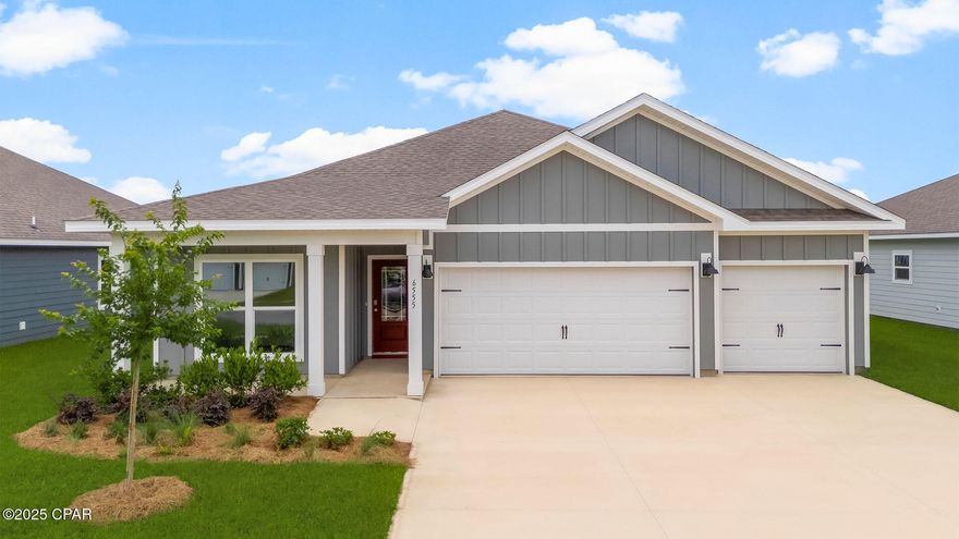 Welcome to 6555 Haskins Drive, a new home floor plan at Liberty in Panama City, Florida. The Madison is one of our many featured one-story homes at the beautiful Liberty community.

When you walk into the home, you are greeted by a long hallway that is the center point for bedrooms, the laundry room and garage, and leads to the open living room and kitchen. Beautiful engineered vinyl plank (EVP) flooring lines the main areas of the house and soft carpet covers the bedrooms.

The bedroom closest to the garage also comes with its own bathroom, not shared in the main hallway. The bathrooms have beautiful white quartz countertops and white cabinets that enhance the beauty of this home.

Entering the kitchen and living room area, you will notice plenty of natural sunlight illuminating the main area. The living room has tray ceilings that open the room, making your living space feel much more comfortable. The kitchen has stainless steel appliances and comes with beautiful white cabinets. The large island has plenty of storage in it and every surface has elegant white quarts countertops. The dining area is located by the back door leading to the covered rear patio.

Walking into the large primary bedroom, you will also see tray ceilings and three windows that wash the room in natural sunlight. The primary bathroom has a spacious double vanity with white quartz countertops and white cabinetry. The walk-in closet is in the bathroom as well, perfect for when you get out of the separate tub or shower with glass doors.

The Madison is a favorite choice among buyers in Liberty. Stop by the model home today to see for yourself and find your next home at Liberty in Panama City!