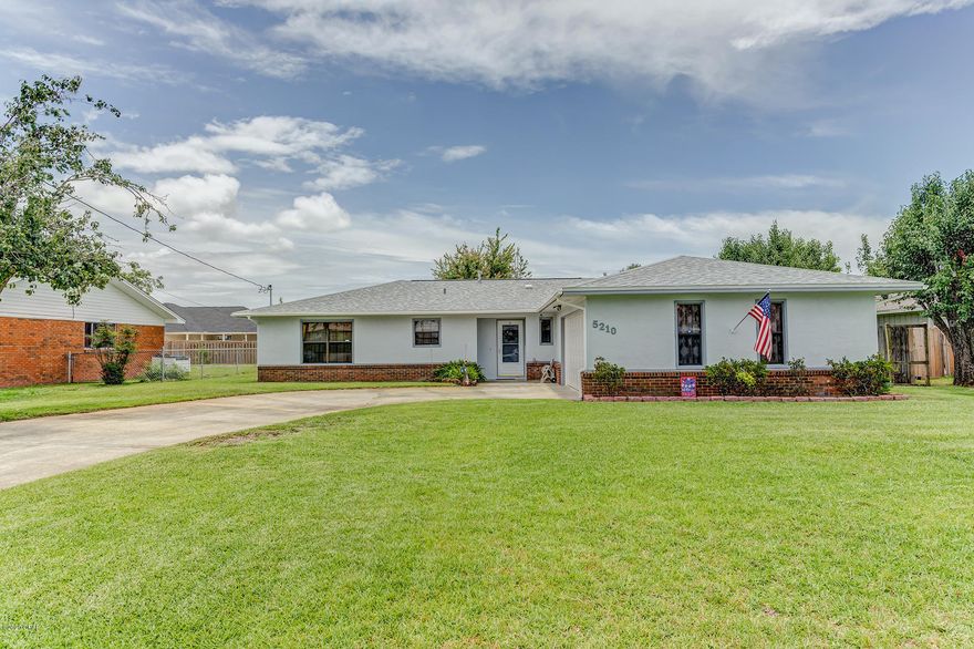 Currently under contract seller accepting backup offers. MOVE-IN READY 3/2 home in Parker just minutes from Tyndall AFB. The home features large family room with cozy wood burning stove, open to the dining room and kitchen, tile floors throughout the main living areas, separate formal living room, large master bedroom with his and hers closets, and private bath, 2 additional spacious bedrooms, and second bathroom. 

The home includes a heat pump, insulated double pane windows, gas water heater and wood burning stove. All the windows are over-sized, making it nice and bright. The Florida room is open to the family room giving plenty of room for entertaining. Some of the extra-special features include a 16x13 workshop on a concrete pad with electricity and A/C and an additional yard building in a peaceful fenced back yard with a Meyer lemon tree.

There is an irrigation well for the sprinkler system. This home survived Hurricane Michael with minimal damage. The Roof was replaced in 2019, minor drywall repairs/ceiling repairs 2019, New garage door 2019. All dimensions are approximate and should be verified if important.