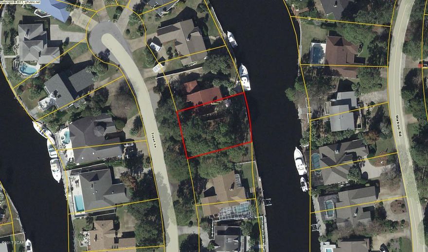BAY POINT WATERFRONT/CANAL LOT WITH GREAT DEEP WATER ACCESS, 5 MINUTES TO THE PASS AND SHELL ISLAND AND THE GULF OF MEXICO. THERE ARE ONLY TWO CANAL LOTS FOR SALE IN ALL OF BAY POINT AND  THIS IS ONE OF THEM.  THINKING OF BUILDING YOUR DREAM HOME, THIS IS IT....HIGH AND DRY.  BAY POINT OFFERS MANY AMENITIES SUCH AS TWO NICKLAUS DESIGNED GOLF COURSES, MARINA, GREAT RESTAURANTS, SERENITY SPA, TENNIS COURTS AND CLOSE TO BEACHES AND STATE PARK.